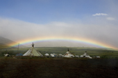 A rainbow over a Khanty reindeer herders' camp in the Polar Ural Mountains. Yamal, Western Siberia, Russia
