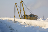 A gas pipeline being constructed in winter near the Yurharovo gas field. Noviy Urengoi, Yamal, Western Siberia, Russia.