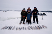 An Inuit family from George River with their catch of Arctic Char & Trout. Ungava Bay, N. Quebec, Nunavik, Canada.