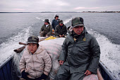 Cree hunter, Josie Sam-Atkinson, and his grandson Tommy Sam set out on an autumn goose hunt. James Bay. Northern Quebec. Canada. 1988