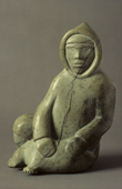 Inuit soapstone carving of a figure. Cape Dorset, Canada.
