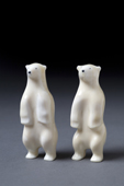 Figures of two polar bears carved from walrus ivory. Thule. Northwest Greenland.