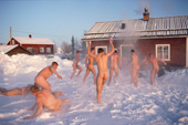 At -30C Swedish Paratroopers cool off in the snow after a Sauna. Jukkasjarvi, Sweden. 1993