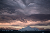 Dramatic Asperatus cloud formation as a storm brews at dawn over Inglefield Bay. Northwest Greenland. 2008