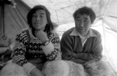 Inuit hunters, Otto Simigak and Kaugunak Qissuk in their tent on a hunting trip. Siorapaluk, Northwest Greenland. 1977