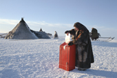 A Tundra Nenets woman voting in the Russian Presidential elections at her camp. Gydan Peninsula, W.Siberia, Russia. 2000