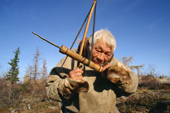 Hek, a Nenets elder, using a traditional bow drill. Yamal, Western Siberia, Russia.